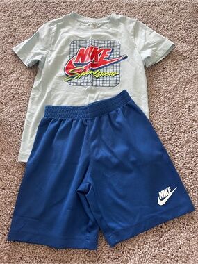 Nike Light Blue Graphic Tee with White Logo